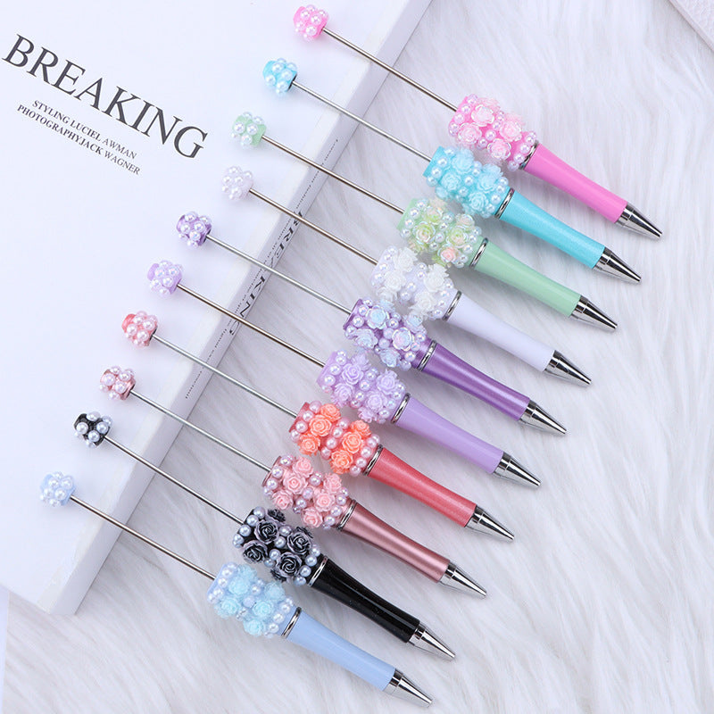Cross-border rose pearl bead pen heavy industry DIY plastic pen, exquisite and creative handmade patch rotating gift pen