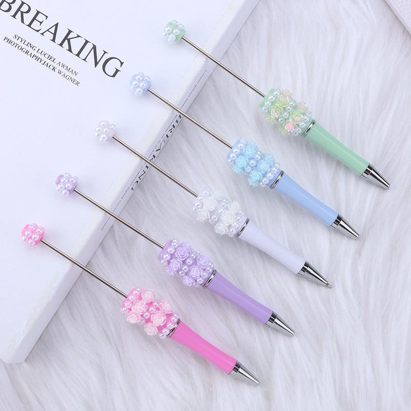 Cross-border rose pearl bead pen heavy industry DIY plastic pen, exquisite and creative handmade patch rotating gift pen