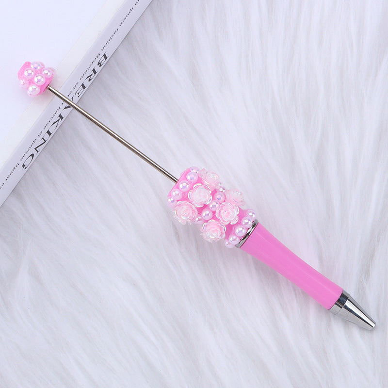 Cross-border rose pearl bead pen heavy industry DIY plastic pen, exquisite and creative handmade patch rotating gift pen