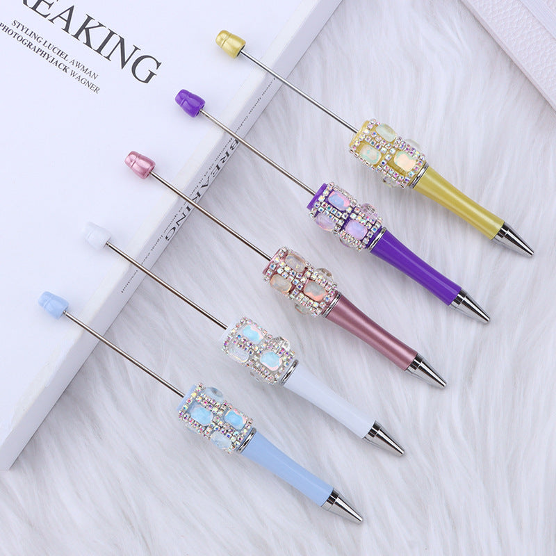 Spot creative gemstone bright diamond bead pen handmade DIY pen wholesale, red crystal agate decorative swirling plastic pen