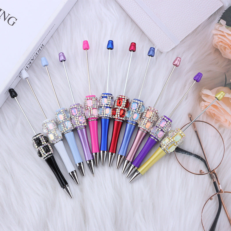 Spot creative gemstone bright diamond bead pen handmade DIY pen wholesale, red crystal agate decorative swirling plastic pen