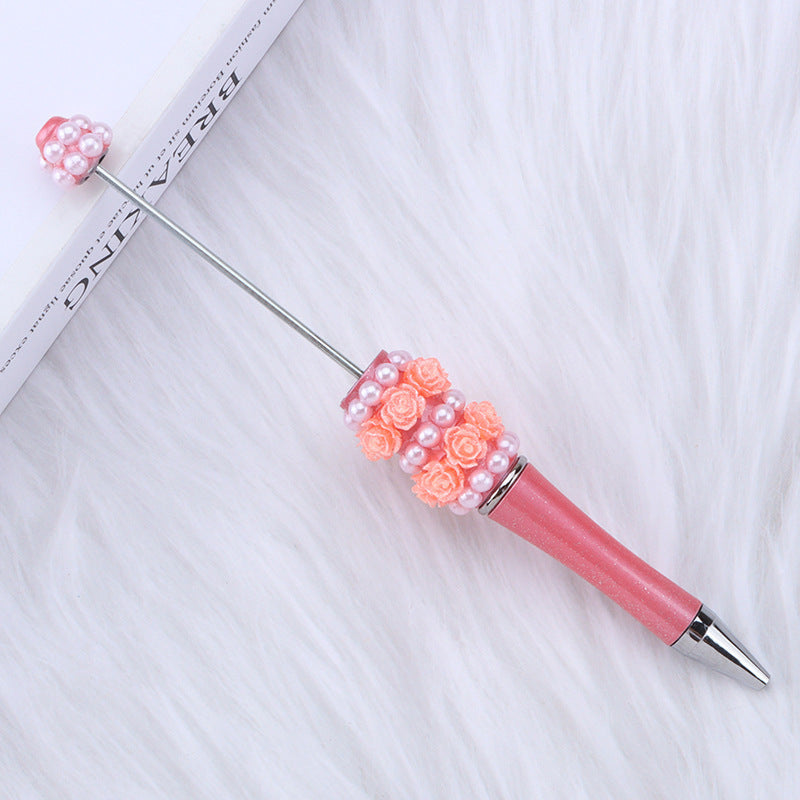 Cross-border rose pearl bead pen heavy industry DIY plastic pen, exquisite and creative handmade patch rotating gift pen