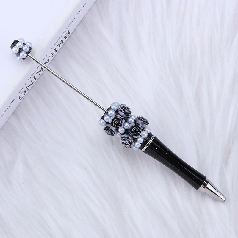 Cross-border rose pearl bead pen heavy industry DIY plastic pen, exquisite and creative handmade patch rotating gift pen