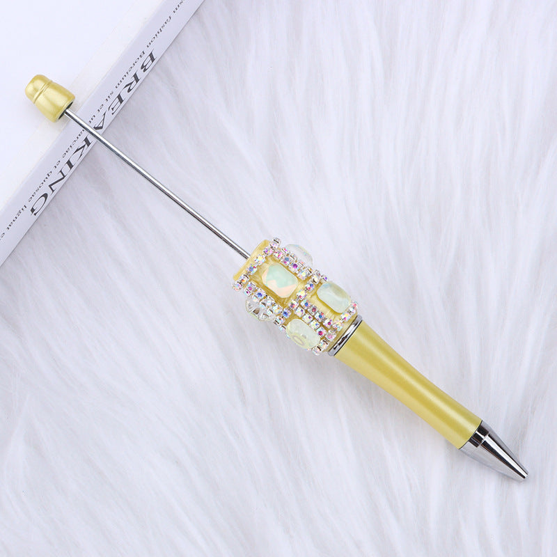 Spot creative gemstone bright diamond bead pen handmade DIY pen wholesale, red crystal agate decorative swirling plastic pen