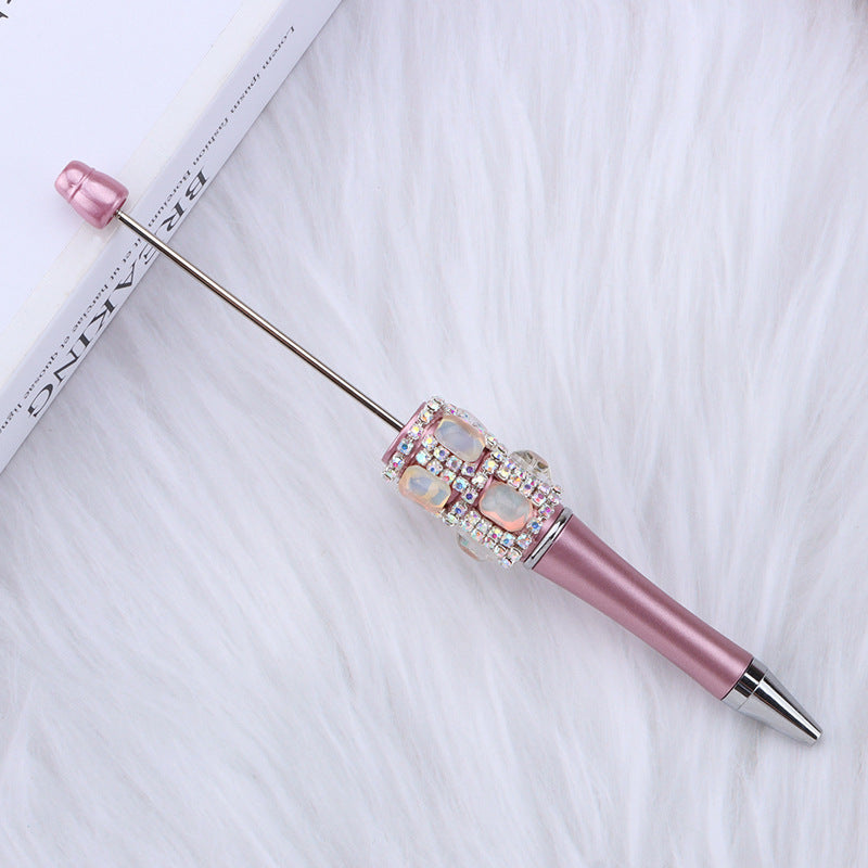 Spot creative gemstone bright diamond bead pen handmade DIY pen wholesale, red crystal agate decorative swirling plastic pen
