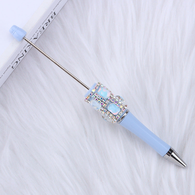 Spot creative gemstone bright diamond bead pen handmade DIY pen wholesale, red crystal agate decorative swirling plastic pen