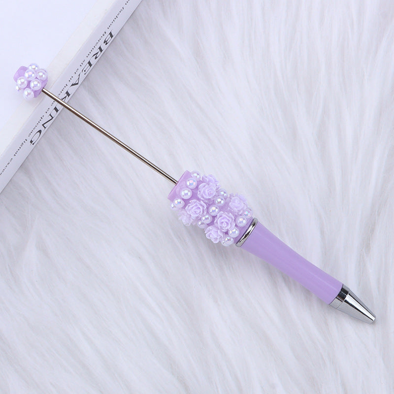 Cross-border rose pearl bead pen heavy industry DIY plastic pen, exquisite and creative handmade patch rotating gift pen