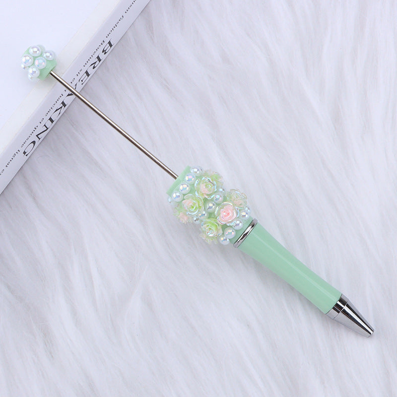 Cross-border rose pearl bead pen heavy industry DIY plastic pen, exquisite and creative handmade patch rotating gift pen